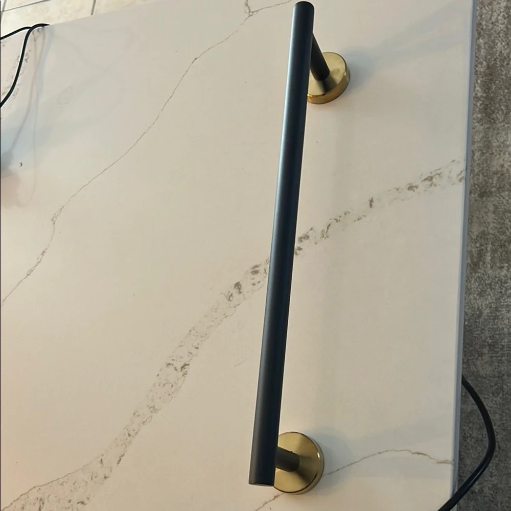 Elegant Black and Gold Towel Bar